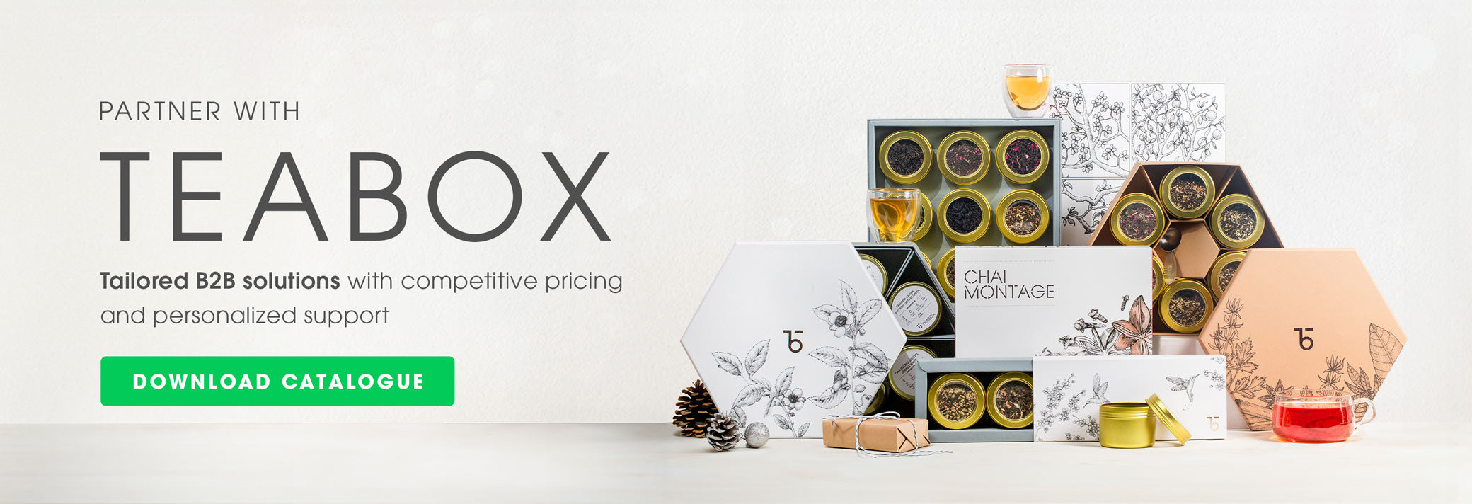 Tea packaging display with text inviting business partnership with Teabox and a green 'Download Catalogue' button.